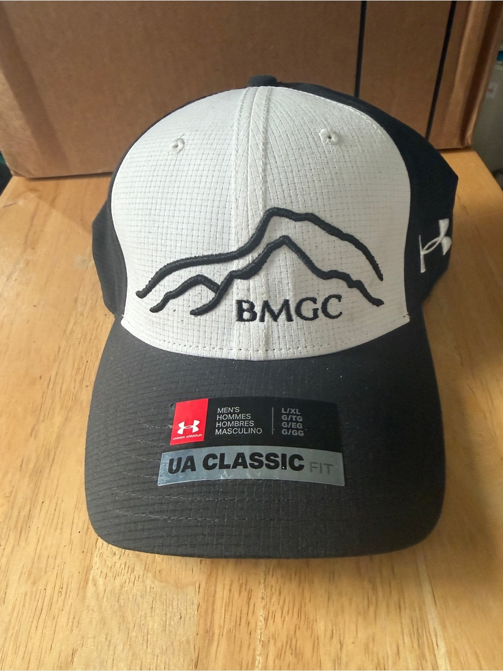 Under Armour Black & White BMGC Logo Baseball Hat